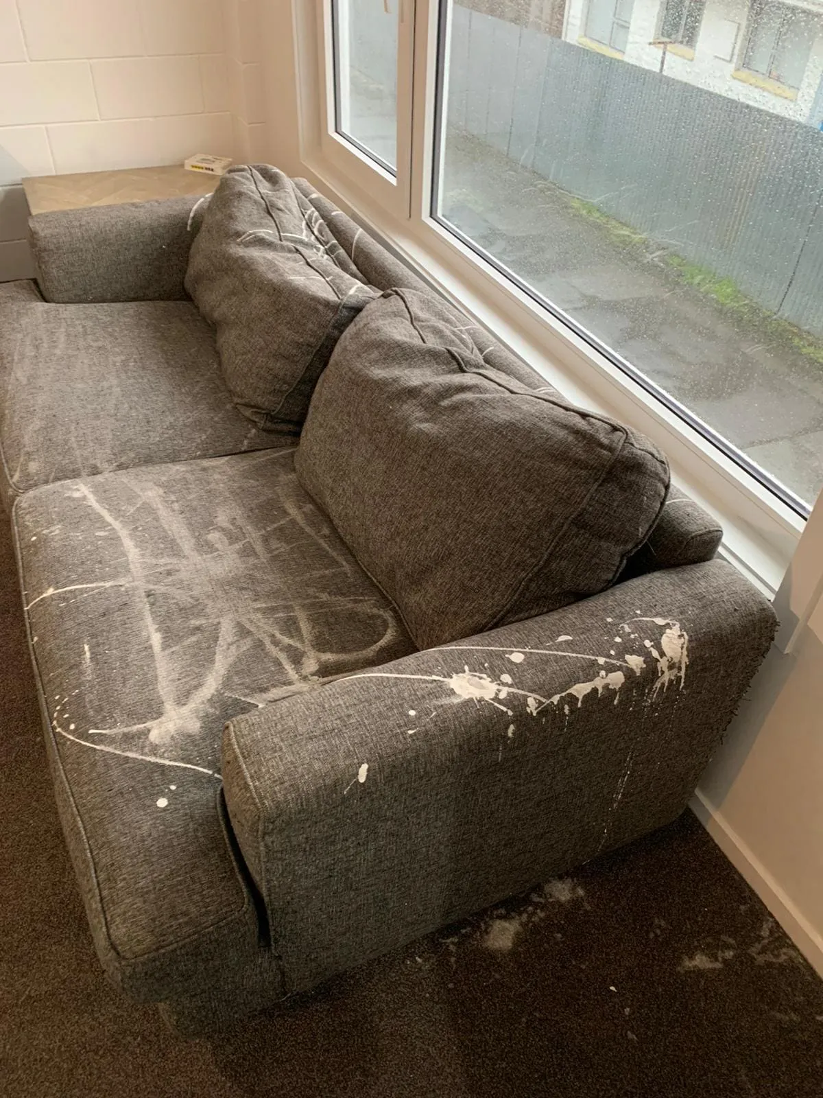 Couch stain before professional stain removal in Christchurch